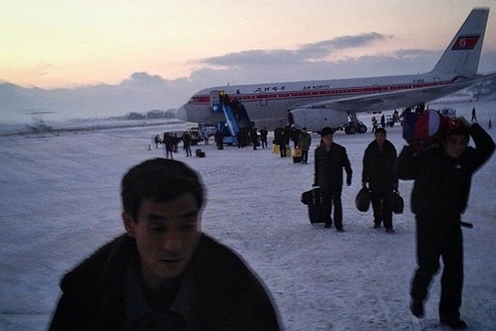 Đây là những hành khách vừa đáp xuống trên một chuyến bay từ Bắc Kinh tới.