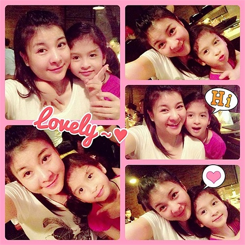 Kim Oanh chụp ảnh nhắng nhít bên con gái xinh xắn.