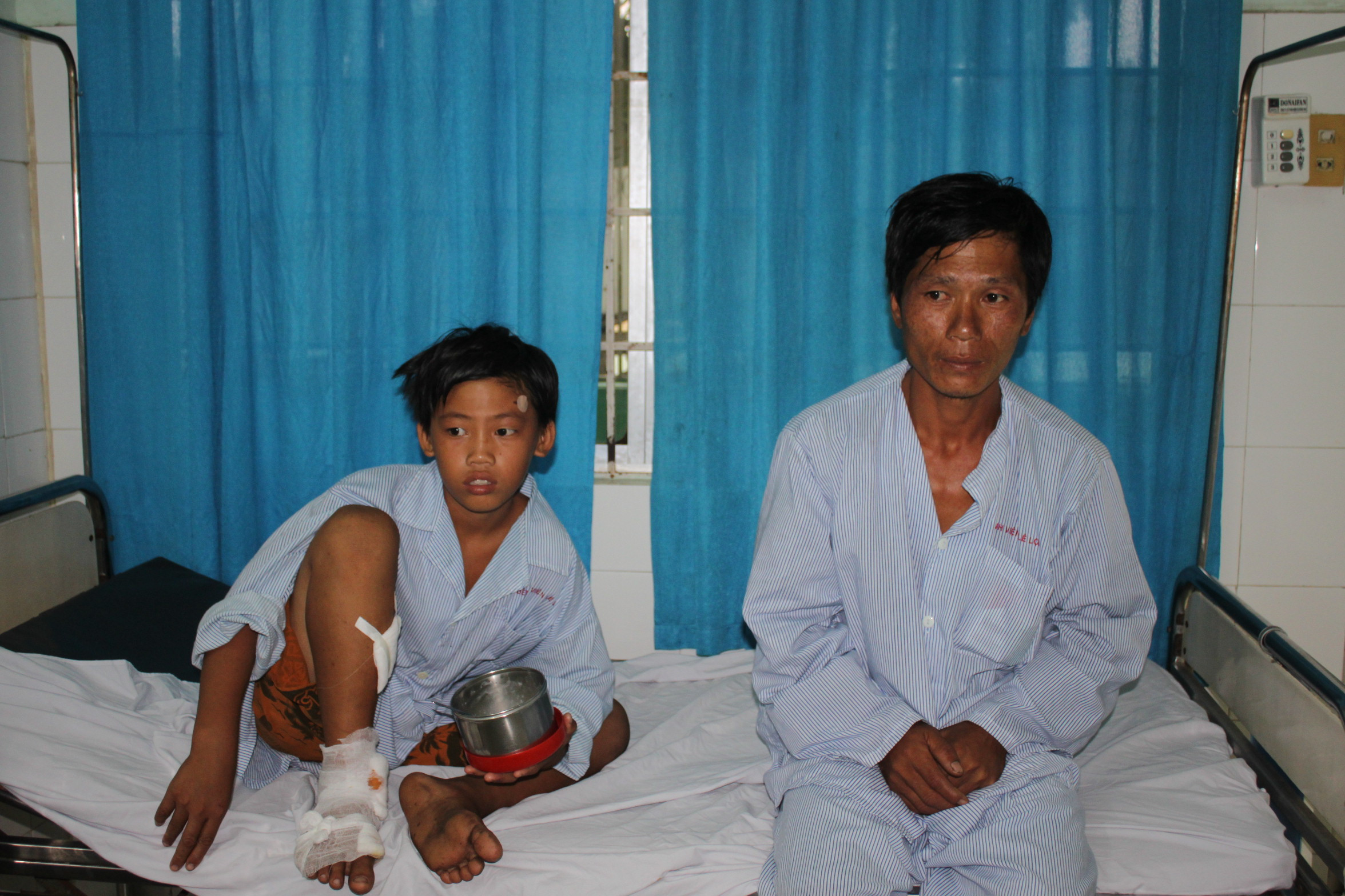 Hai cha con anh Nguyễn Văn Thanh và cháu Nguyễn Văn Bé