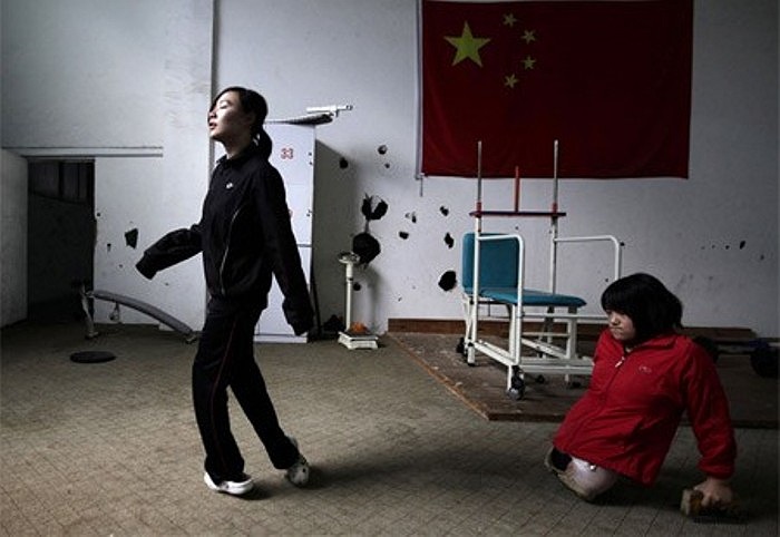 Hình ảnh Hongyan năm 16 tuổi trong một ca tập chạy bộ trước khi dự giải London 2012 Paralympic Games.