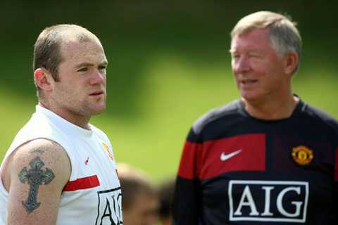 Rooney và Alex Ferguson trên sân tập