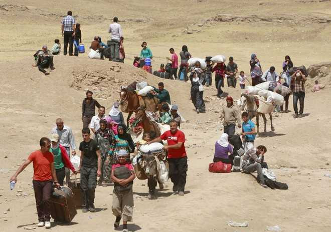 Sợ chiến tranh, hàng nghìn người Syria chạy trốn