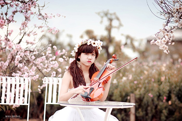 Cũng như bao teen khác, Kiều Oanh thường đến trường bằng xe đạp.