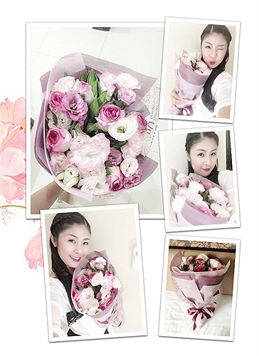 Ngắm vẻ đẹp đằm thắm của Hoa hậu Ngọc Hân khoe sắc bên hoa.