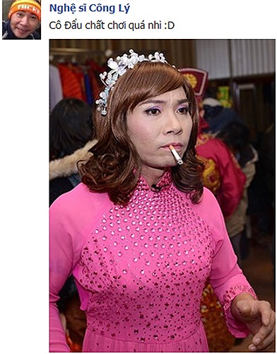 Công Lý diện áo dài hồng và phì phèo thuốc lá