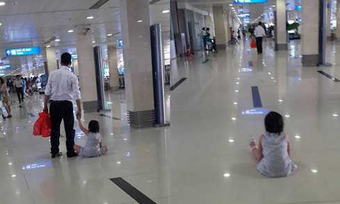 Người đàn ông kéo lê cháu bé trên sàn, sau khi anh Hải lên tiếng, người này đã bỏ bé lại và vội vã bước đi - Ảnh: Nhân chứng cung cấp Người đàn ông kéo lê cháu bé trên sàn, sau khi anh Hải lên tiếng, người này đã bỏ bé lại và vội vã bước đi - Ảnh: Nhân chứng cung cấp