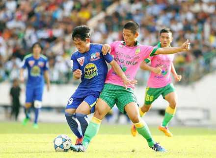 Lê Đức Lộc (phải) đã từng gác giấc mơ trở thành một thầy giáo