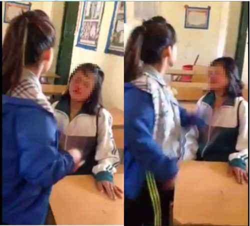 Nữ sinh tát bạn 50 cái khiến bạn cùng lớp chảy máu mũi - Ảnh cắt từ clip.