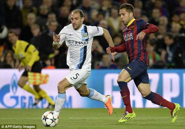 Pacey: Barcelona's defender Jordi Alba attempts to keep up with Pablo Zabaleta