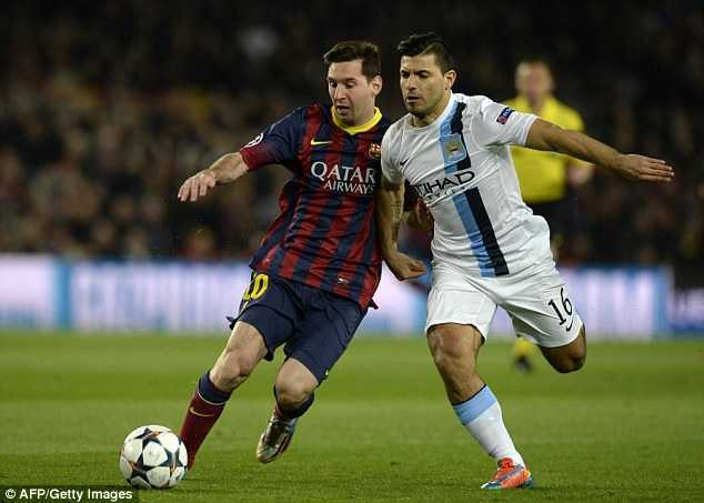 Tussle: Argentine stars Lionel Messi and Sergio Aguero battle for the ball in the first-half