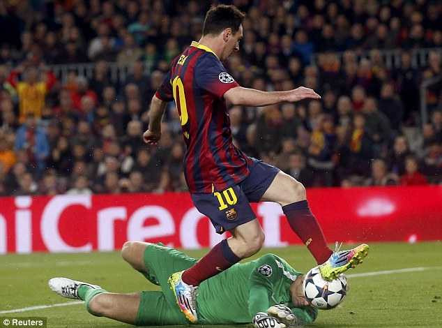 Nipping in: Manchester City's goalkeeper Joe Hart attempts to gather the ball from Messi's feet