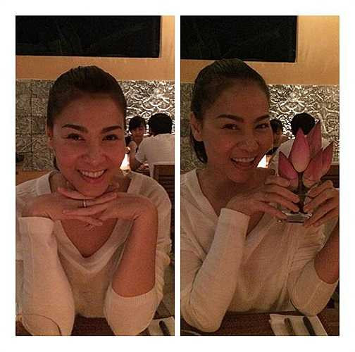 Thu Minh dịu dàng tạo dáng.