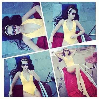 Trong MV, Hà Anh diện những bộ cánh mát mẻ, khoe vẻ quyến rũ của hình thể.