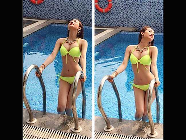 Minh Hằng nóng bỏng khoe vòng một căng tròn trong bộ bikini. 