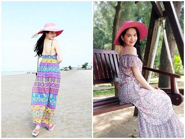 Váy maxi dáng dài có màu sắc tươi trẻ được nhiều tín đồ thời trang diện đi biển, Ngọc Trinh là một trong số đó. Nữ người mẫu duyên dáng hơn khi kết hợp cùng mũ rộng vành. 