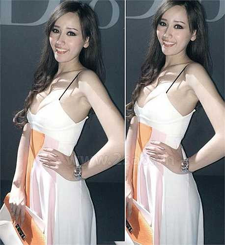 Chiếc váy hàng hiệu dương như quá nhỏ so với vòng một 'cỡ bự' của Hoa hậu Mai Phương Thúy.