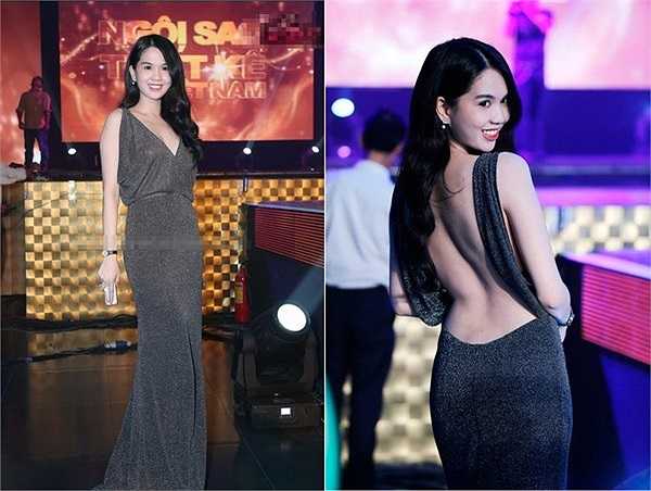 Ngọc Trinh lại có phần 'lép vế' hơn khi chọn đầm ánh kim tối giản, khoe trọn lưng ong mượt mà - lợi thế đã trở thành thương hiệu của cô.