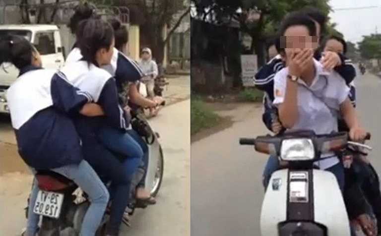 Nữ sinh kẹp 5, lạng lách, đánh võng trên đường.