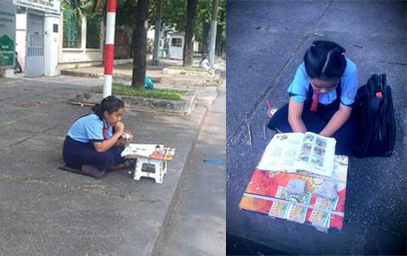 em bé bán vé số