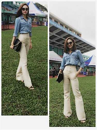 Minh Hằng mới đây gây bất ngờ với phong cách trẻ trung của quần cạp cao và sơ mi denim.