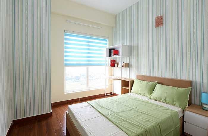 Phòng ngủ cho trẻ nhỏ được thiết kế bằng tông màu xanh tạo cảm giác tươi mát, trong lành. Điểm nhấn của phòng này nội thất được thiết kế dùng được cho mọi lứa tuổi.