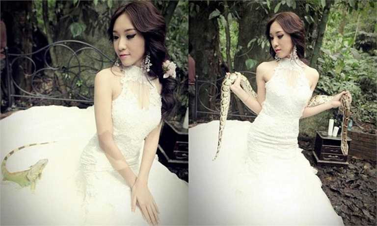 Hot girl mạnh dạn quấn trăn, ôm rồng trong MV Quên đi, năm 2013.