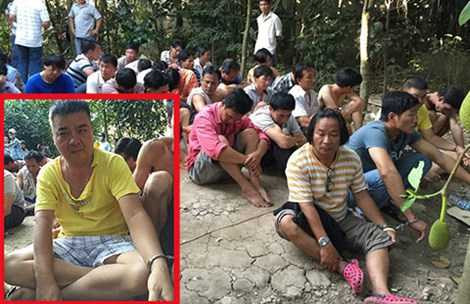 Trương Văn Lộc và các con bạc tham gia sòng gà bị bắt quả tang. Ảnh: HA