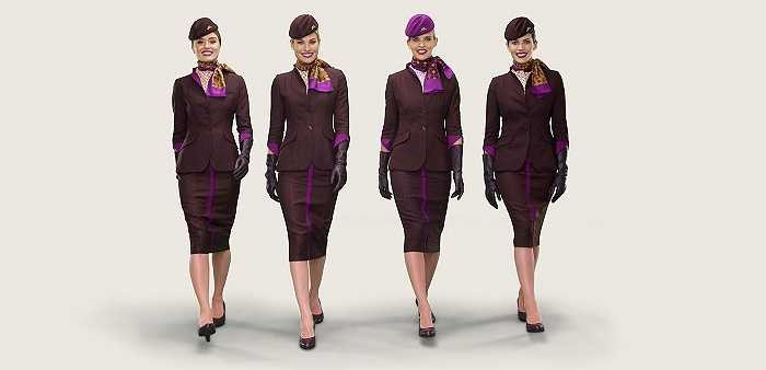 Etihad Airways là hãng hàng không của Dubai với bộ đồng phục hết sức sang trọng và tôn dáng của các tiếp viên với tông màu tím trầm điểm xuyết vài đường tím sáng nổi bật.