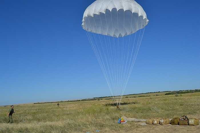 Tiếp đất theo vị trí được sỹ quan chỉ định.