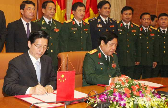 Lễ ký Thỏa thuận hợp tác về việc thiết lập cơ chế phối hợp biên phòng 3 cấp giữa Bộ Quốc phòng Việt Nam và Bộ Công an Trung Quốc