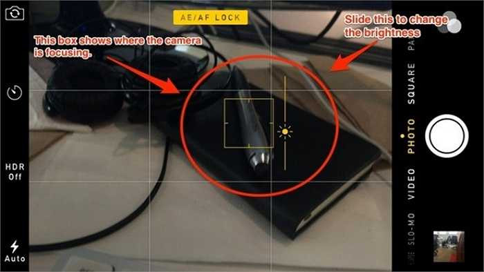 Chạm vào màn hình để lấy nét rồi trượt ngón tay lên hoặc xuống để điều chỉnh sáng tối. 