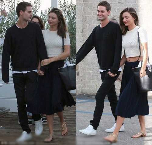 Miranda Kerr tình tứ bên bạn trai, Rihanna lộ eo bánh mì