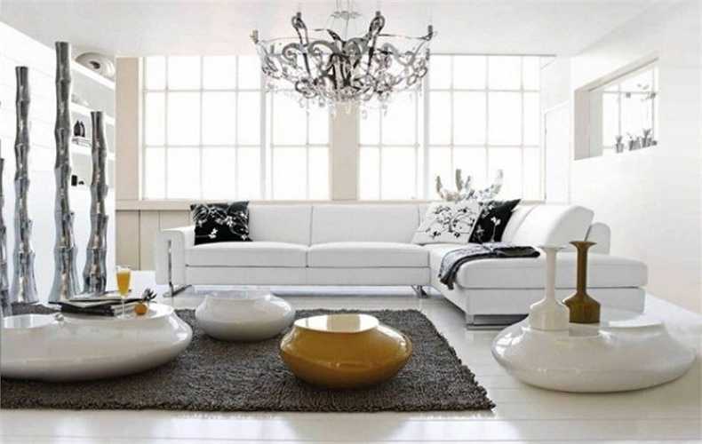 Không gian sinh hoạt chung gồm có phòng khách, phòng bếp, phòng ăn và nhà vệ sinh. Ghế sofa chữ L sang trọng, lịch sự. 