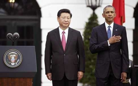 Chủ tịch Trung Quốc Tập Cận Bình và Tổng thống Barack Obama thực hiện nghi lễ tại Nhà Trắng