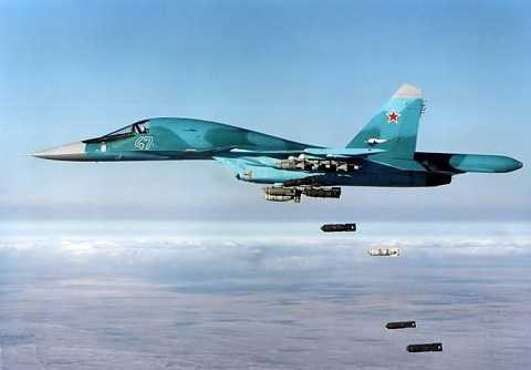 Thú mỏ vịt Su-34 của Không quân Nga đang nhả bom Thú mỏ vịt Su-34 của Không quân Nga đang nhả bom
