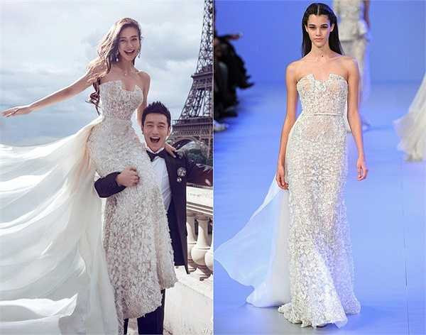 Một mẫu thiết kế váy cưới khác của Elie Saab được Angelababy sử dụng trong bộ ảnh cưới là một thiết kế kiểu cúp ngực và ôm sát đường cong cơ thể, trong khi phần tà váy dài uốn lượn, mềm mại.