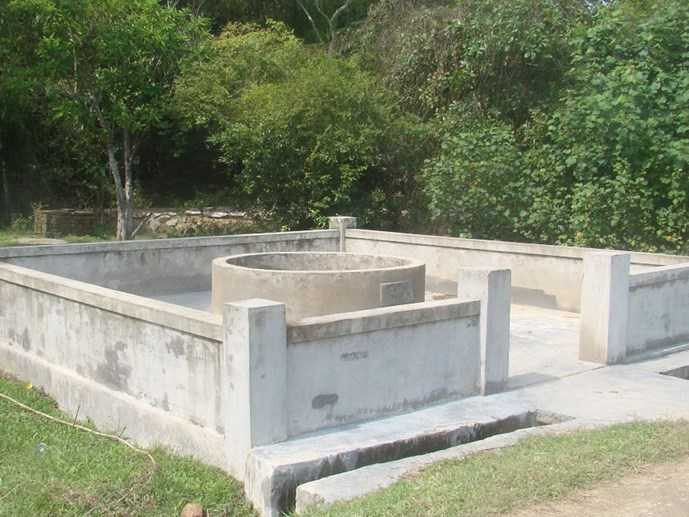 Giếng làng nơi phát hiện thi thể bé C. (Ảnh: Lộc Dũng)