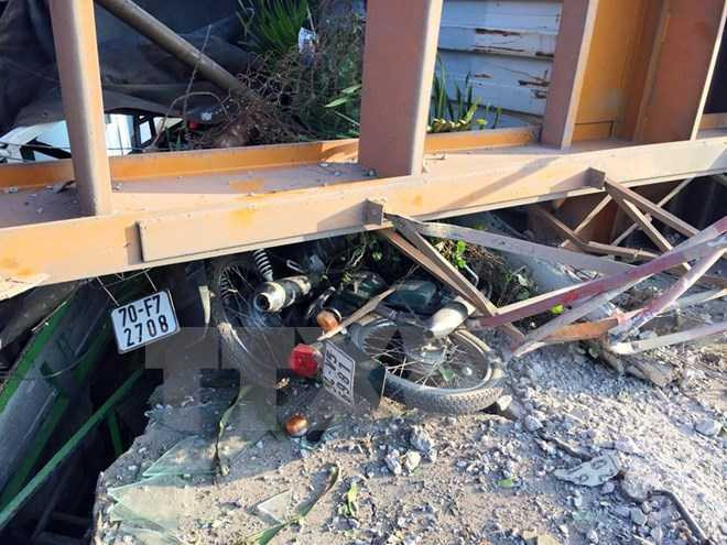 Vụ tai nạn khiến 2 người tử vong. (Ảnh: Lê Đức Hoảnh/TTXVN)