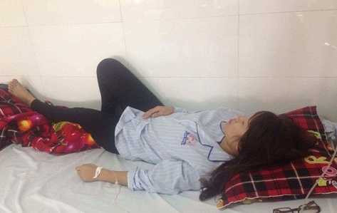 Con chị T nhập viện sau khi bị đánh