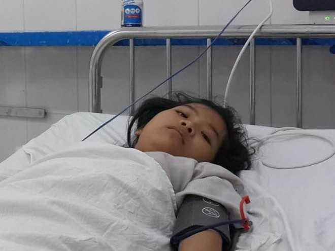 Hà Thị Hải Hậu nằm điều trị tại bệnh viện. Ảnh: N.A.