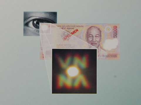 Hình ẩn trên cửa sổ nhỏ chưa từng xuất hiện trên tiền giả.
