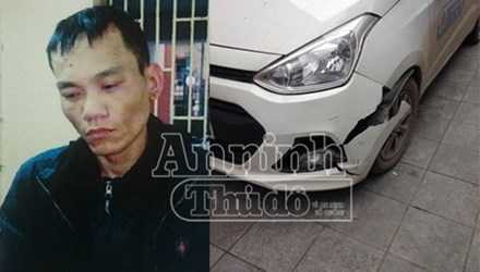 Đối tượng cướp taxi Nguyễn Văn Tú cùng chiếc xe taxi bị hư hại sau va chạm