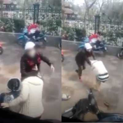 Hình ảnh người phụ nữ mang bầu bị đánh ngay trước cổng Văn Miếu Hình ảnh người phụ nữ mang bầu bị đánh ngay trước cổng Văn Miếu