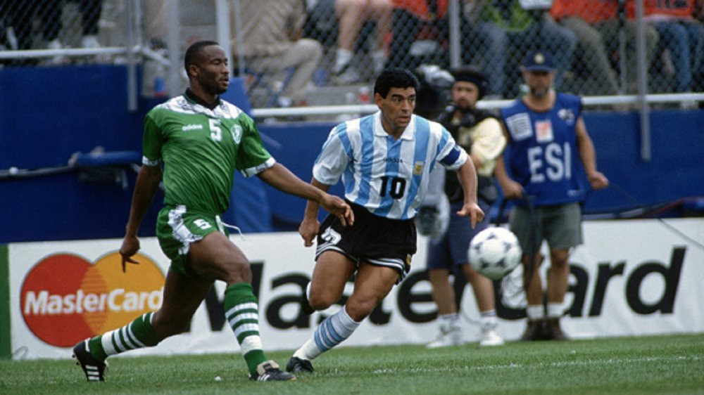 argentina-vs-nigeria-at-the-1994-world-cup-football-championships-uche-okechukwu-and-diego-maradona_7kwqqq0glur615pfuzik0bg5u