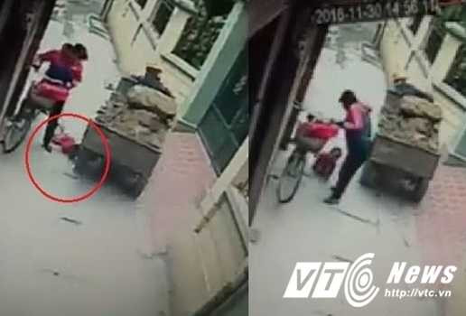 clip-thot-tim-nhin-dua-tre-roi-tu-xe-dap-xuong-duong-suyt-bi-xe-ba-banh-cho-cat-can-14-091817