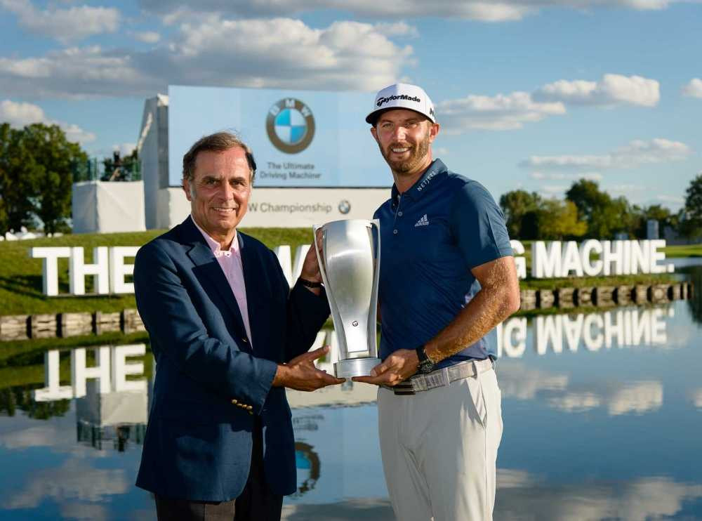 P90232413-ludwig-willisch-president--ceo-bmw-of-north-america-and-2016-bmw-championship-winner-dustin-johnson--2020px
