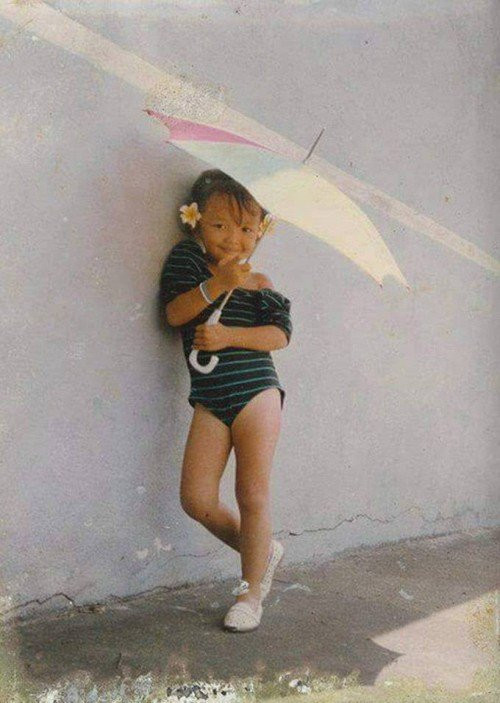 Thử tài đoán tên sao Việt qua loạt ảnh thời 'cởi truồng tắm mưa'