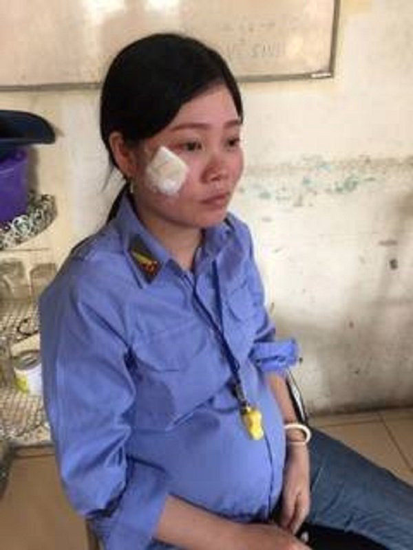 Hinh anh Nhan vien gac tau mang thai bi hanh hung: ‘Toi mong xu nghiem ke con do vo hoc da hanh hung toi’