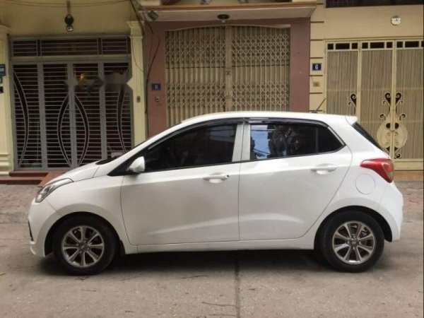 1544490878-ban-hyundai-grand-i10-10-mt-doi-2015-mau-trang-nhap-khau-xe-gia-dinh-gia-295tr1-picture5571