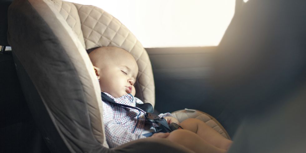 baby-sleeping-in-car-royalty-free-image-475120352-1557175437